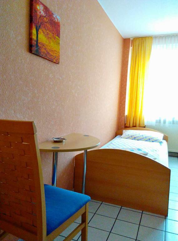 Hotel Yans Обергаузен Номер фото